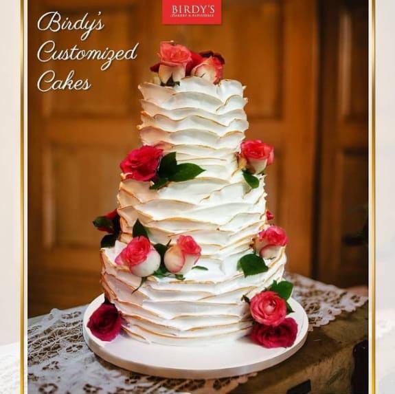 Customised cake 1800 per kg (Anniversary and wedding cake)